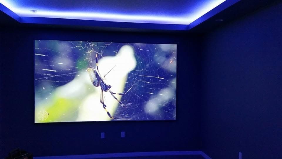 The same theater screen under blue cove lighting